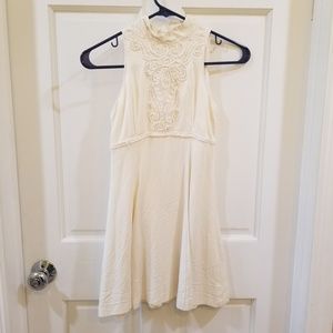 Cream colored embellished dress